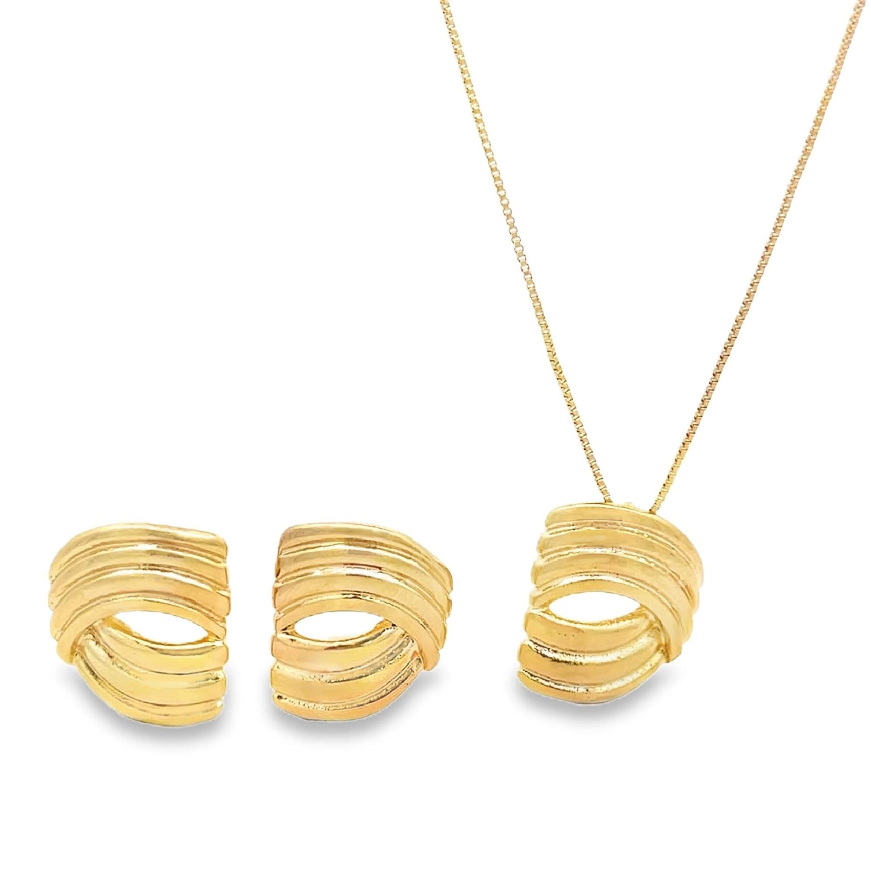 A matching gold jewelry set features ribbed, swirl-design earrings and a pendant necklace displayed against a white background.