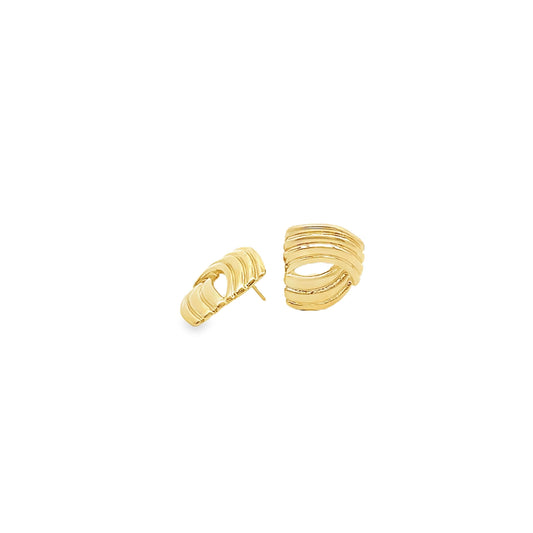 A pair of shiny gold ribbed dome earrings rests against a clean white background.