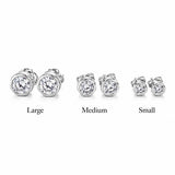 Classic round bezel CZ stud earrings crafted in 18K Gold Filled. Available in multiple sizes. Hypoallergenic, tarnish resistant, and perfect for everyday wear.