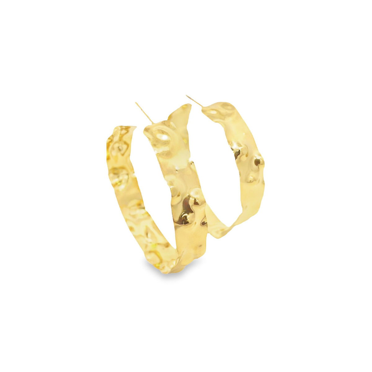 A pair of gold textured hoop earrings rest against a plain white background.