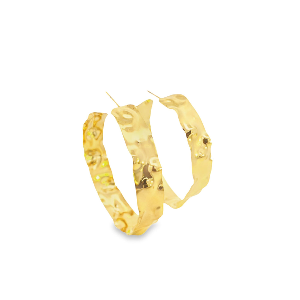 A pair of textured gold hoop earrings displays a shiny, uneven surface against a clean white background.