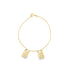 A delicate gold chain bracelet features two rectangular engraved religious pendants hanging from the clasp.