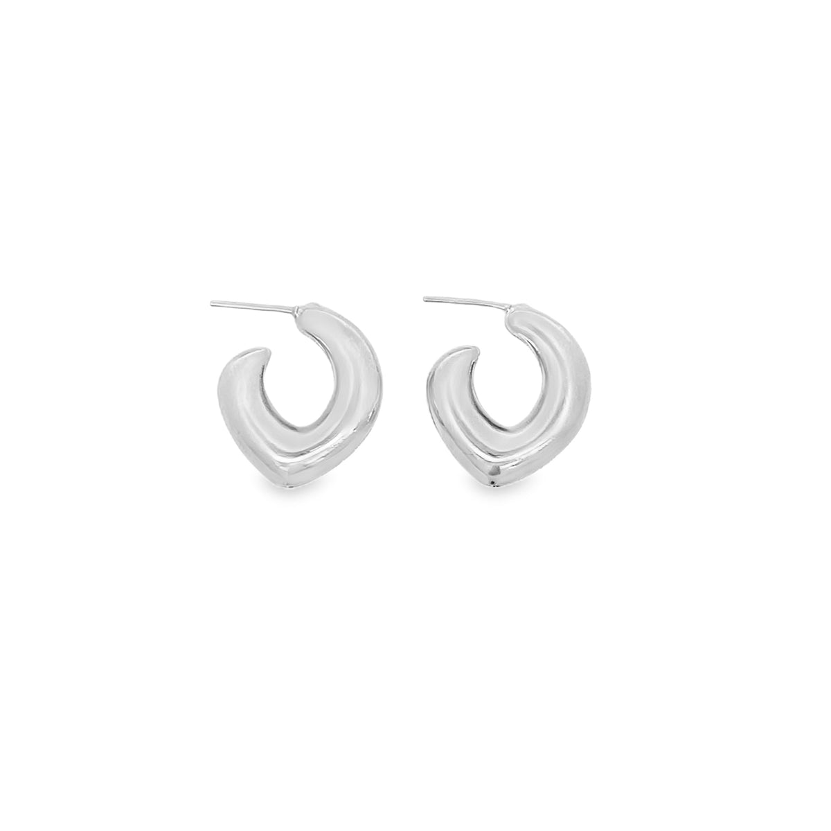A pair of chunky silver hoop earrings rest on a clean white background.