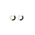 A pair of gold huggie hoop earrings featuring split enamel designs in glossy black and white.