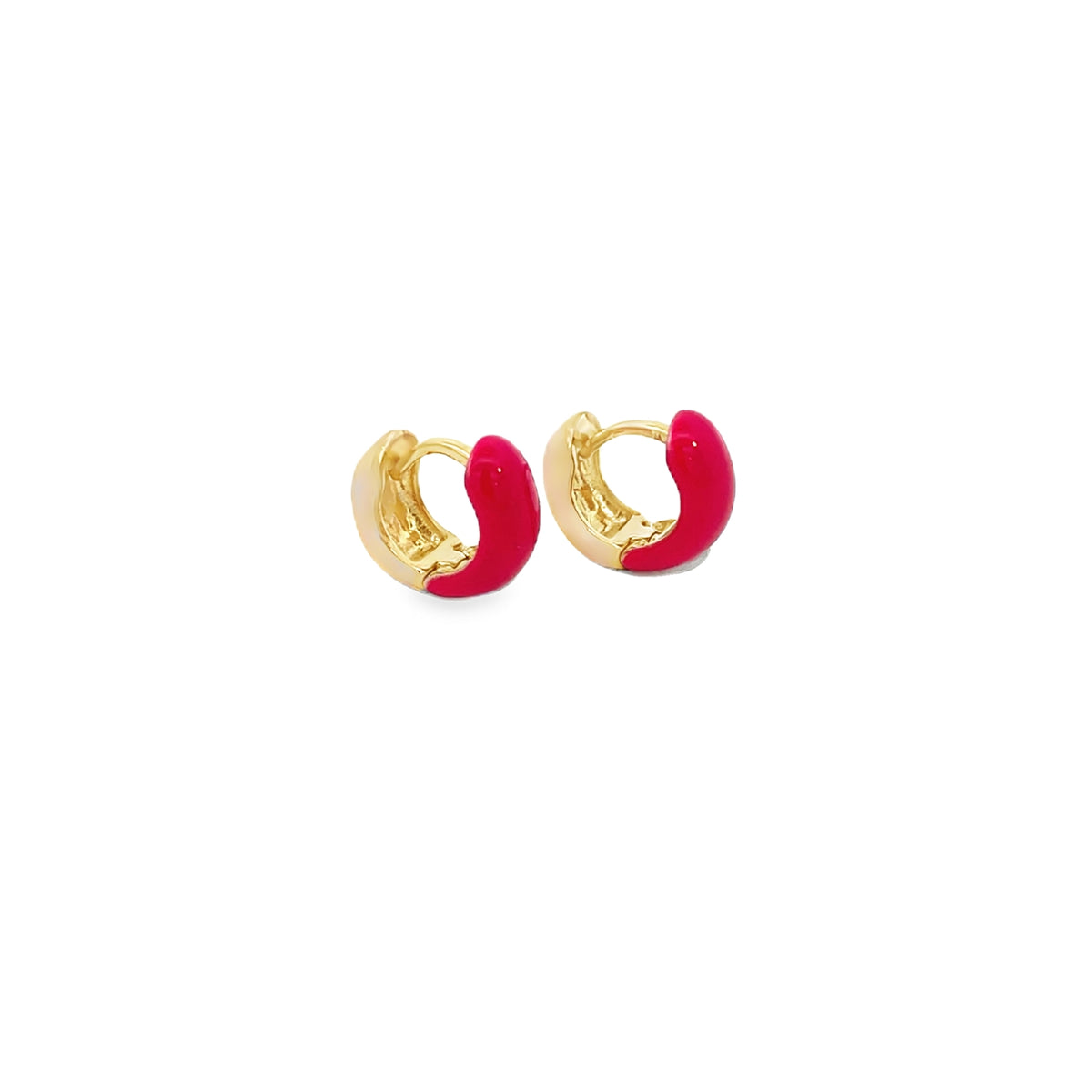A pair of small gold hoop earrings feature bright pink enamel accents against a clean white background.