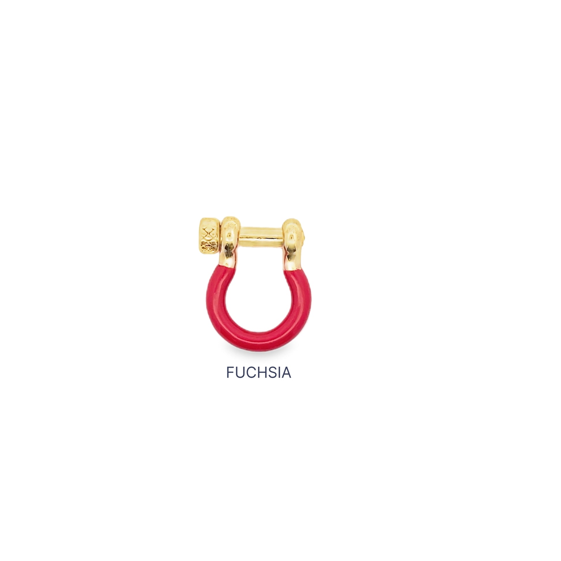 A gold shackle earring features a vibrant fuchsia enamel coating on its curved bottom.