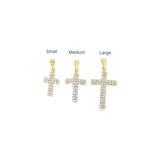 Three gold cross pendants encrusted with diamonds are displayed in small, medium, and large sizes.