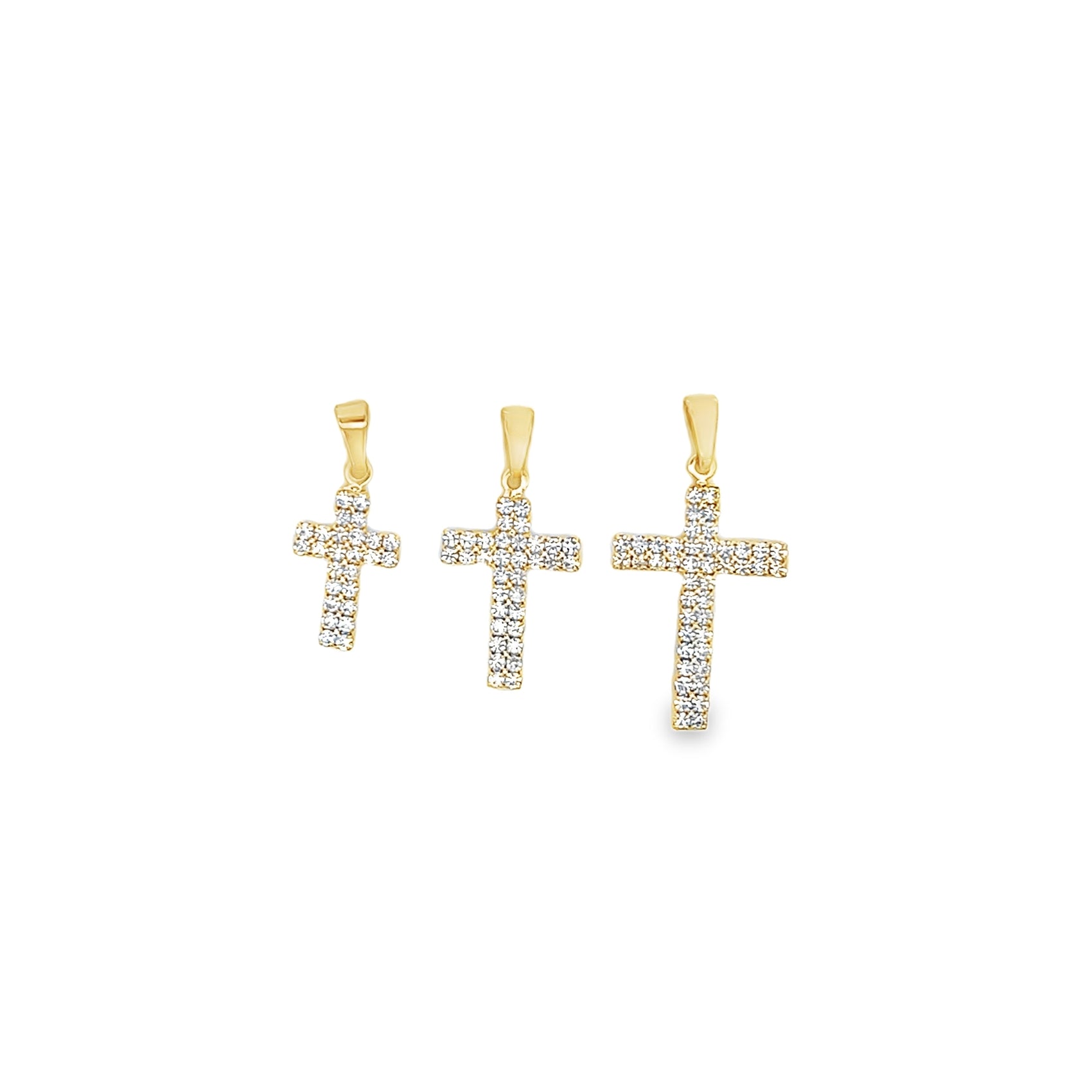 Three graduating gold cross pendants encrusted with shimmering diamonds are displayed on a white background.