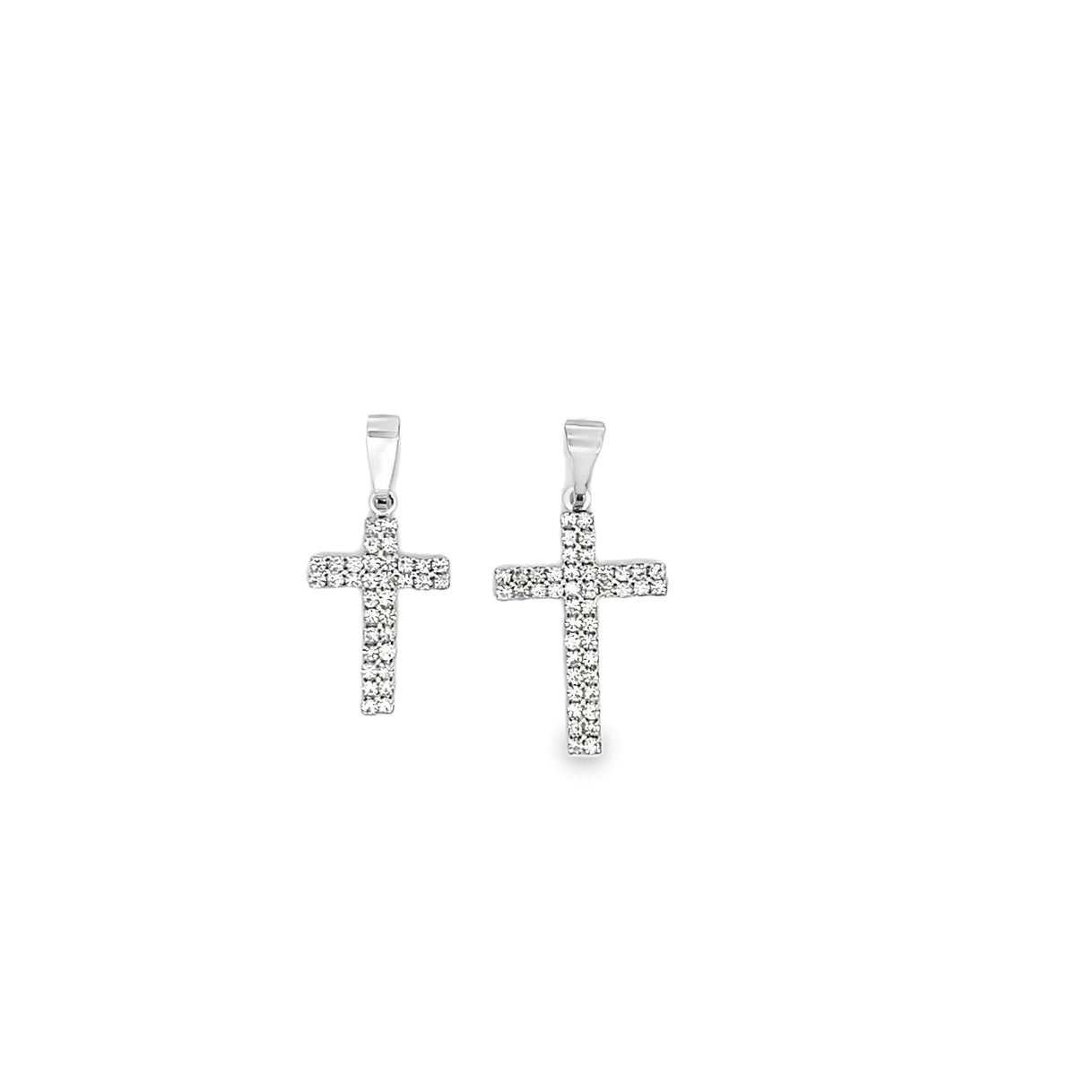 A pair of sparkling diamond-pave cross earrings gleams against a clean white background.