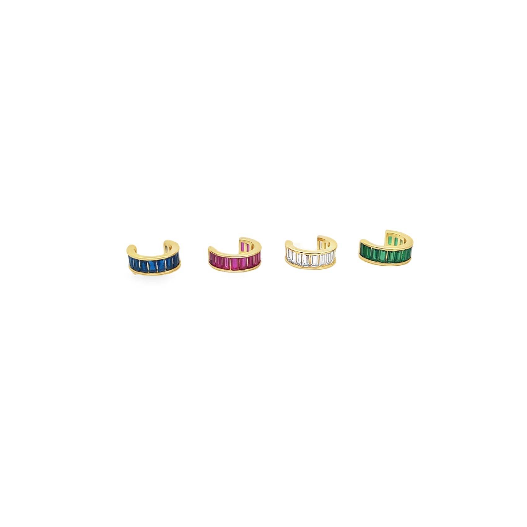 Four gold ear cuffs set with colorful baguette-cut stones in blue, pink, white, and green display in a row on a white background.