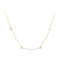 A delicate gold chain necklace spells out the word MAMA with individual letter charms spaced along the metal links.