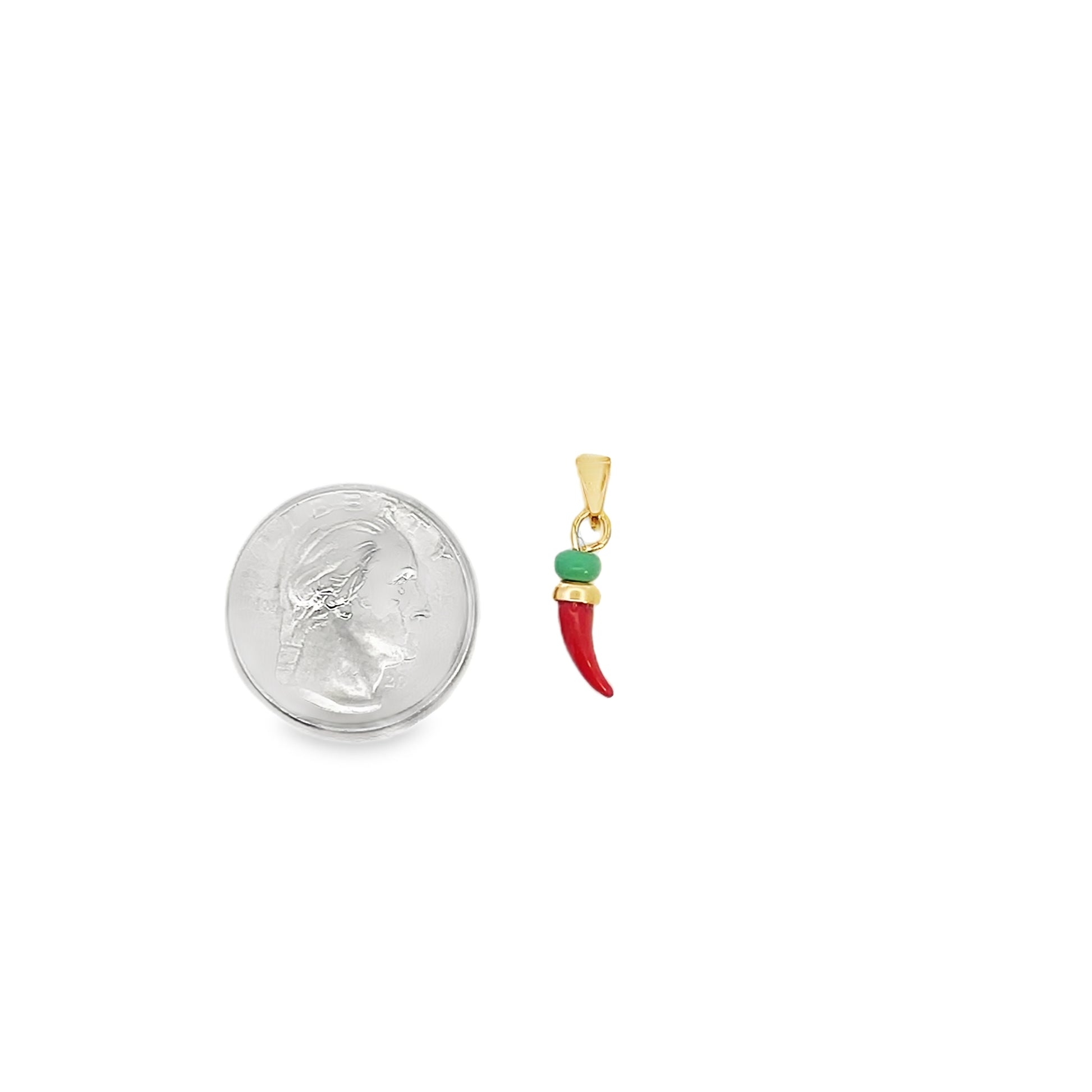 A gold chili pepper charm featuring red enamel and a green bead rests beside a US quarter for scale.
