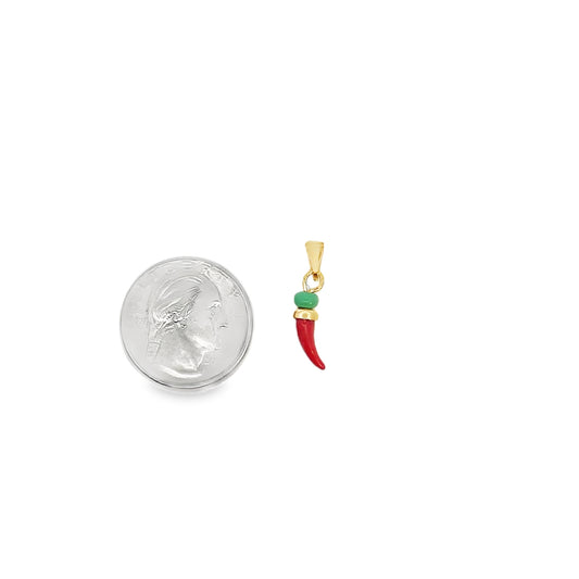 A gold chili pepper charm featuring red enamel and a green bead rests beside a US quarter for scale.