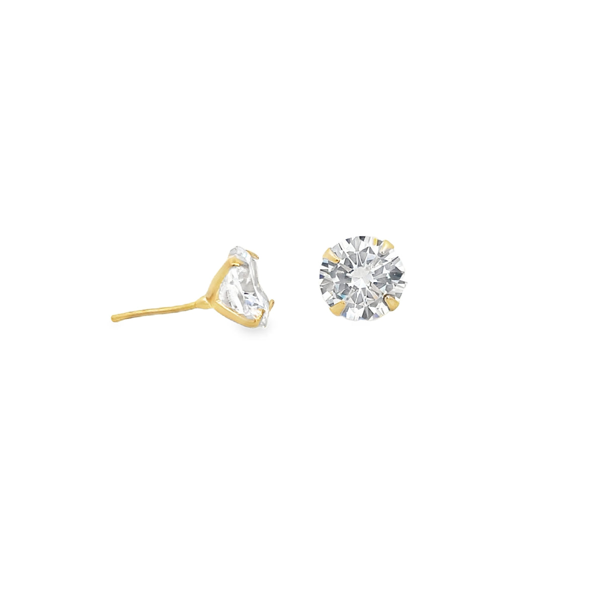 A pair of round diamond stud earrings set in gold sits against a clean white background.