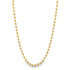 A delicate gold bead chain necklace drapes gracefully against a white background.