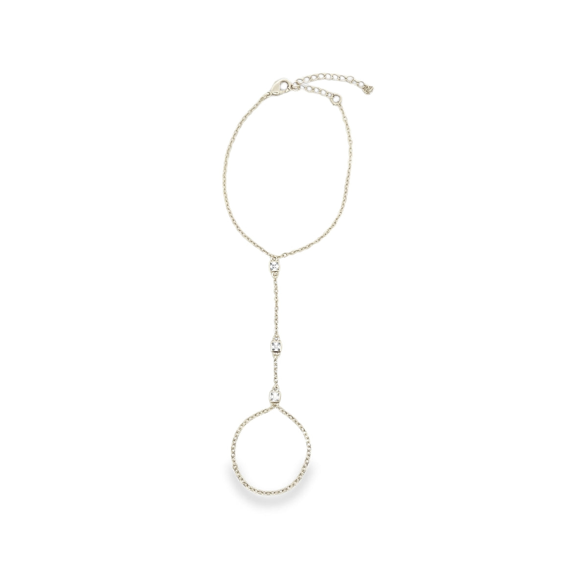A delicate silver slave bracelet features sparkling crystal accents along the chain and finger ring against a clean white background.
