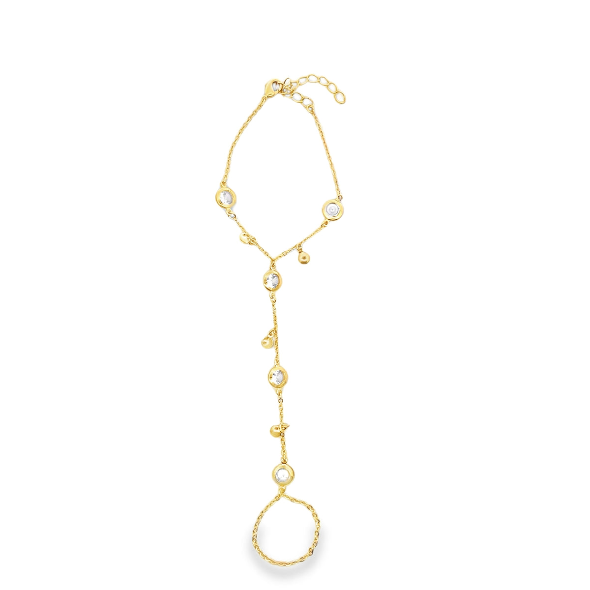A delicate gold slave bracelet features bezel-set crystal stones and dangles against a clean white background.