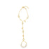 A delicate gold slave bracelet features bezel-set crystal stones and dangles against a clean white background.