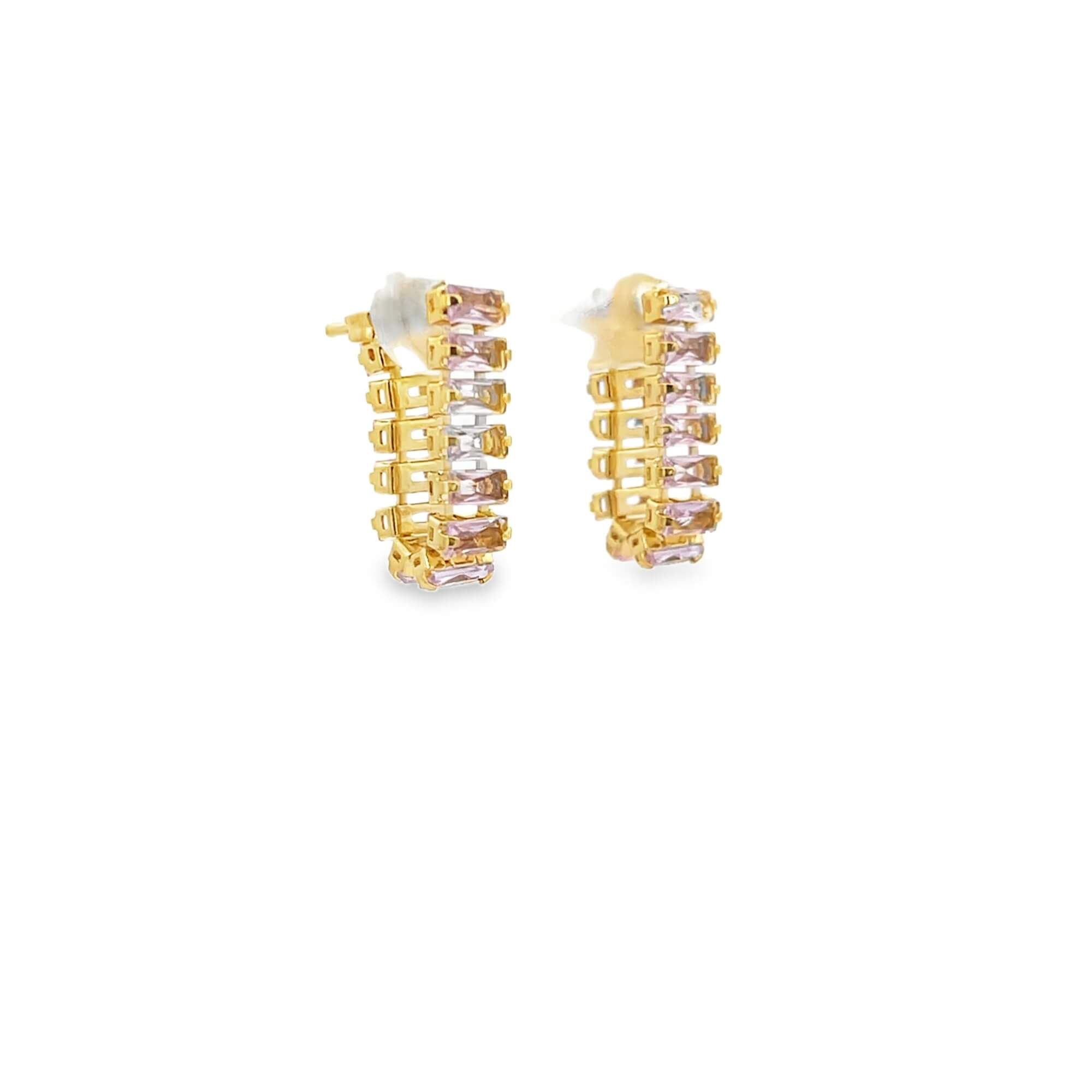 huggie earrings with blue baguette cubic zirconia stones. Modern crystal huggies with a sleek vertical design.