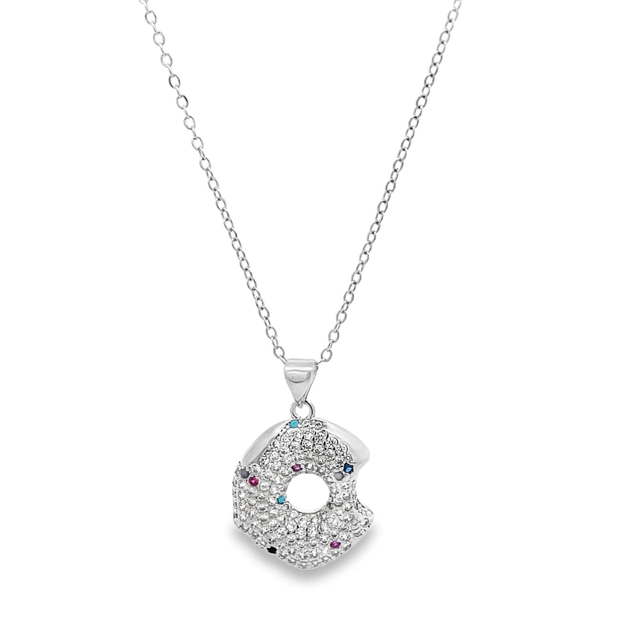 Modern gold open circle pendant necklace featuring pavé cubic zirconia stones. A minimalist yet eye-catching necklace perfect for layering or everyday wear.