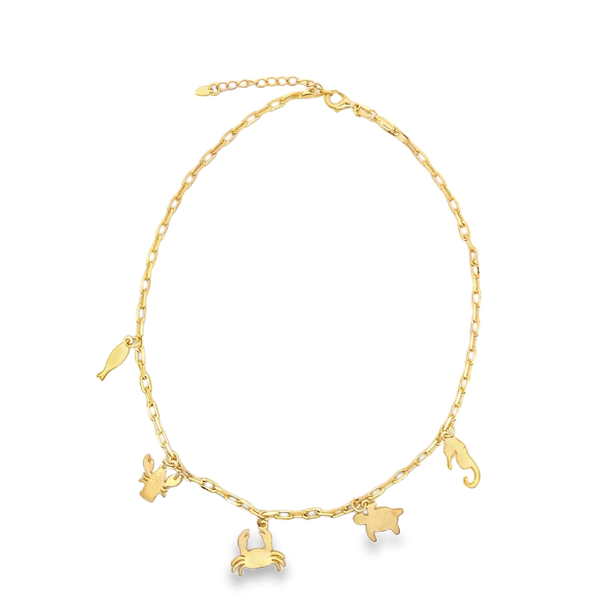 Gold charm necklace featuring zodiac and animal pendants including crab, bull, fish, turtle, and seahorse on a paperclip chain. Perfect for layering.