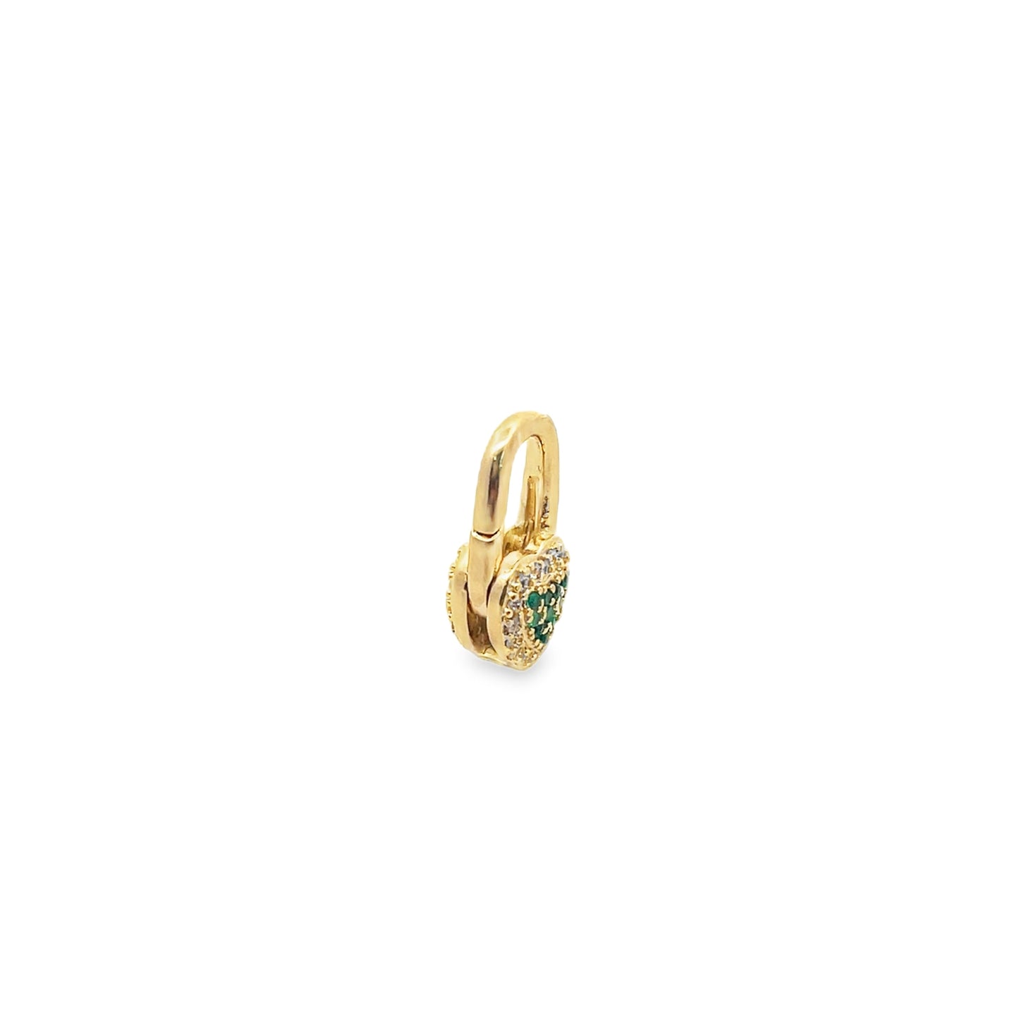 A gold padlock charm featuring pave diamonds and emerald crystals rests against a white background.