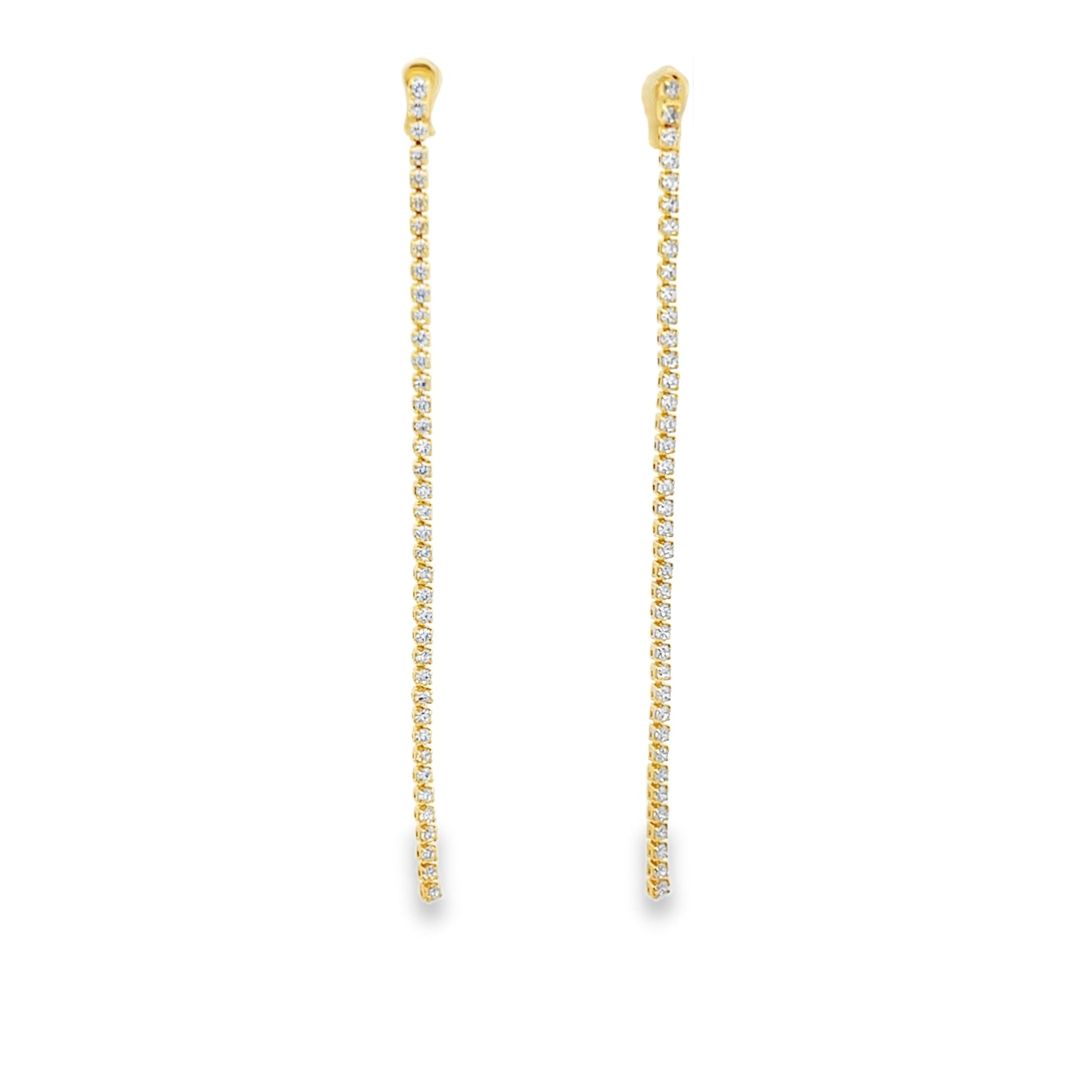 Elegant long CZ tennis drop earrings in gold or silver plating. Sparkling cubic zirconia dangle earrings perfect for bridal and formal wear.