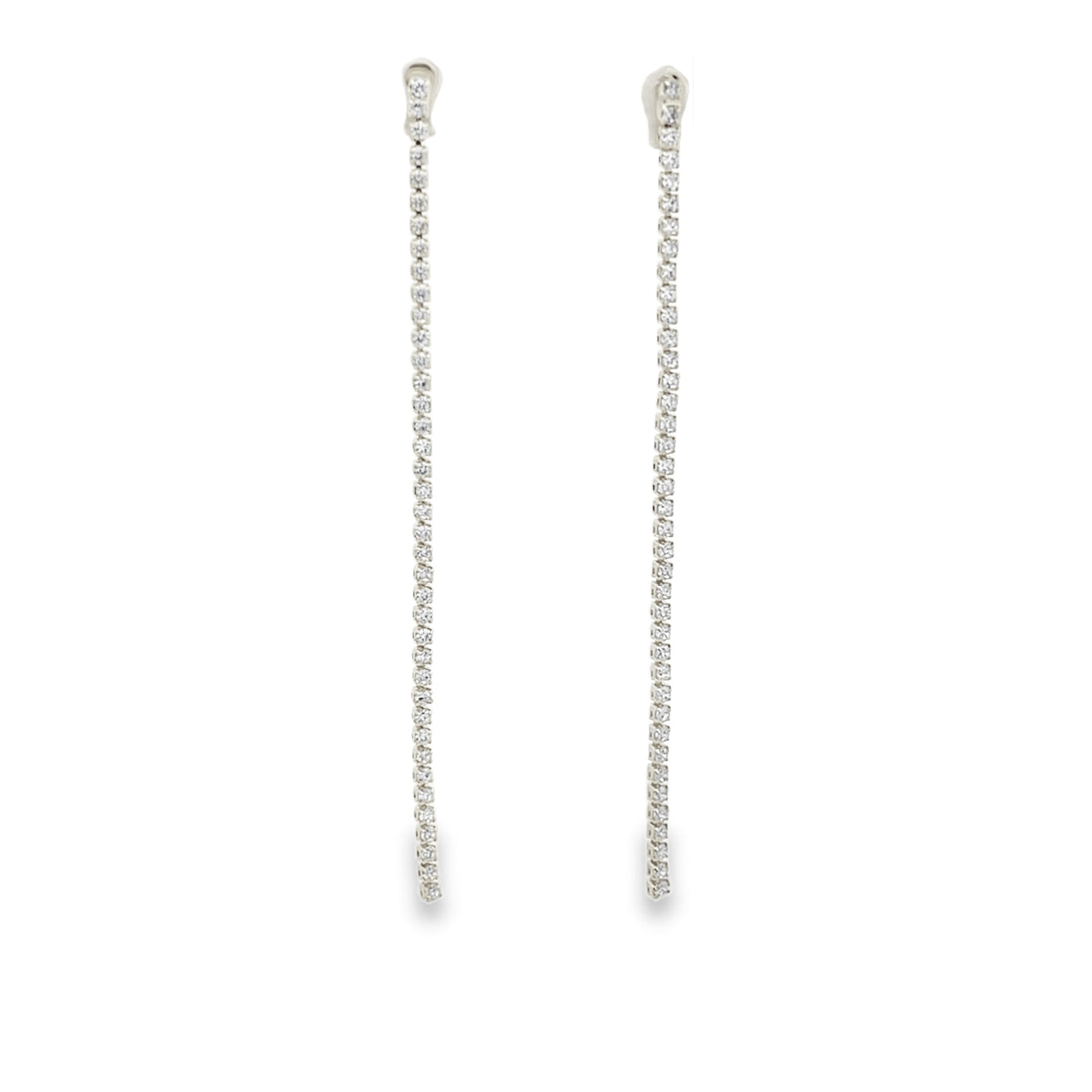 Elegant long CZ tennis drop earrings in gold or silver plating. Sparkling cubic zirconia dangle earrings perfect for bridal and formal wear.