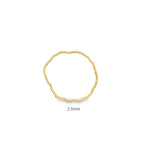 Heavy gold beaded stretch bracelet with thick polished ball beads. Chunky, statement design with substantial weight and luxury shine.