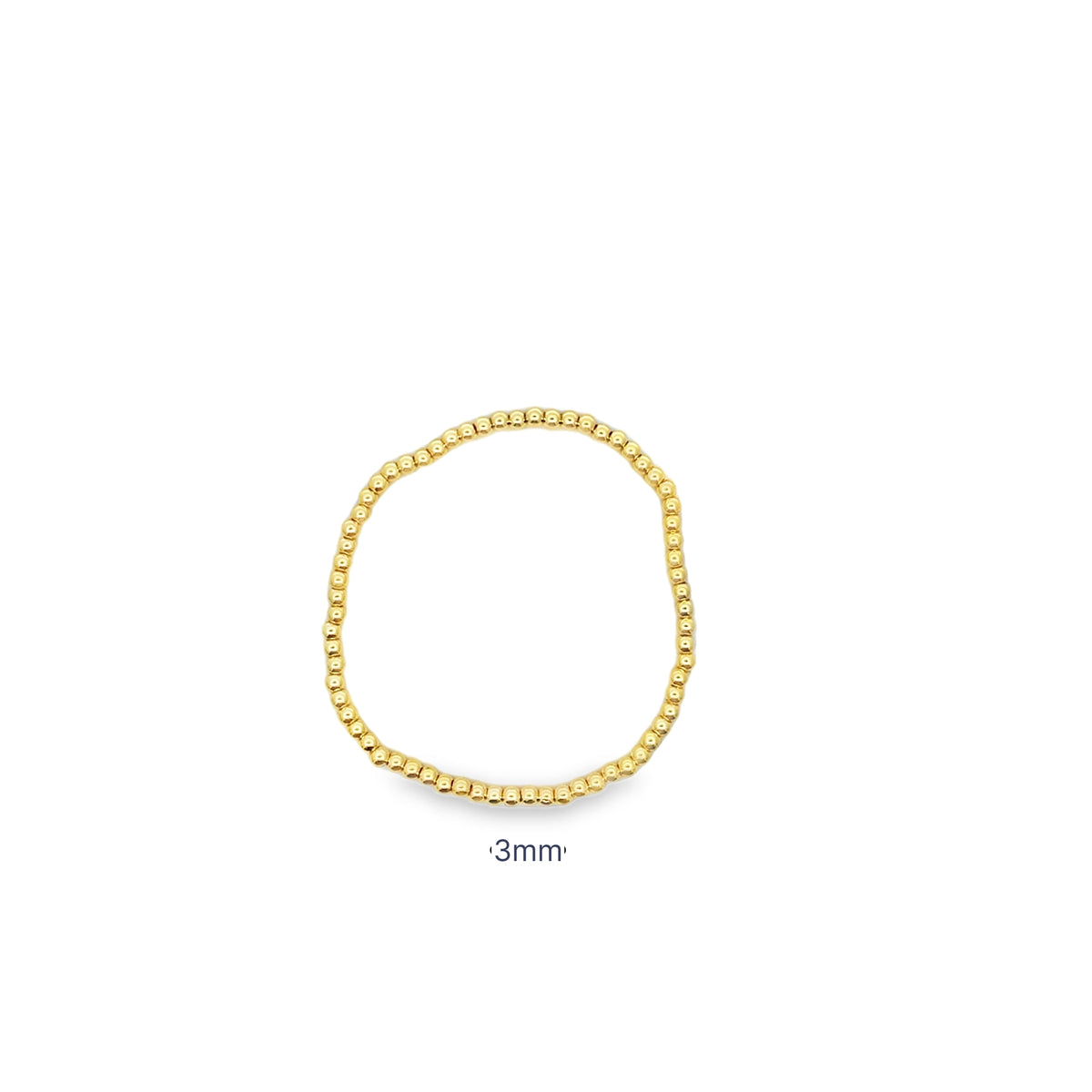 Heavy gold beaded stretch bracelet with thick polished ball beads. Chunky, statement design with substantial weight and luxury shine.