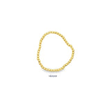 Heavy gold beaded stretch bracelet with thick polished ball beads. Chunky, statement design with substantial weight and luxury shine.