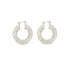 A pair of polished silver twisted hoop earrings glistens against a plain white background.
