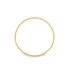 A sleek, twisted gold ring lies flat on a clean white background.