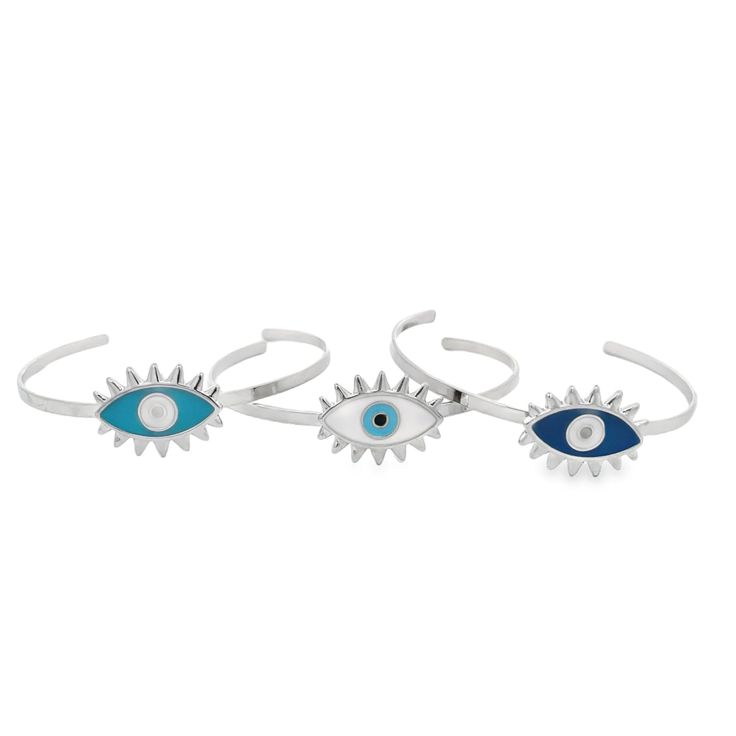 Three silver cuff bracelets display vibrant enamel evil eye charms in turquoise, white, and dark blue against a white background.