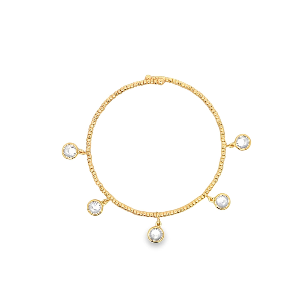 A delicate gold beaded charm bracelet features five sparkling dangling crystal charms against a clean white background.