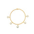 A delicate gold beaded charm bracelet features five sparkling crystal pendants hanging along its band.