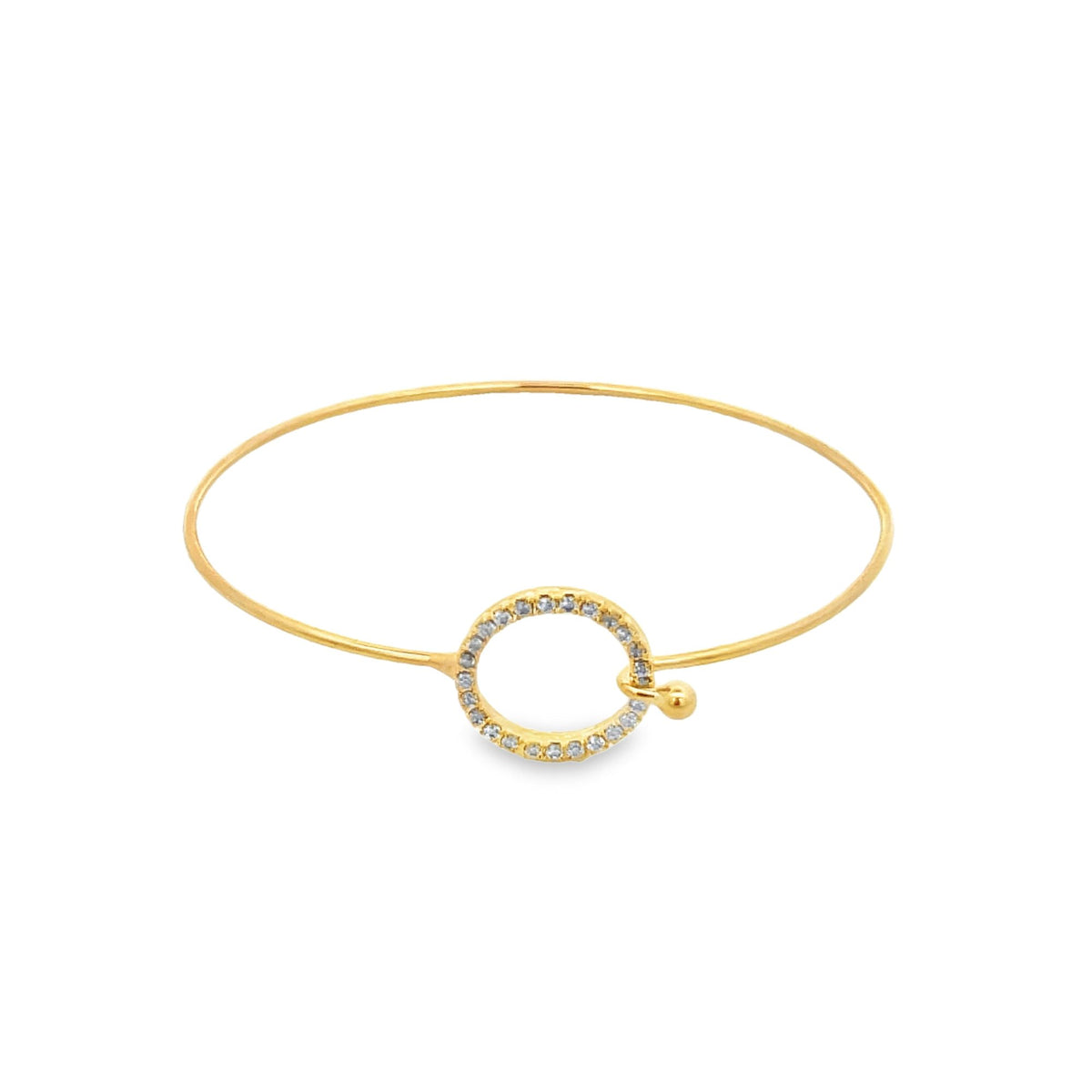A sleek gold bangle bracelet features a sparkling pavé diamond-encrusted circular clasp with a delicate hook closure against a clean white background.