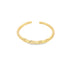 A minimal gold ring features a delicate, wavy design along the front band.