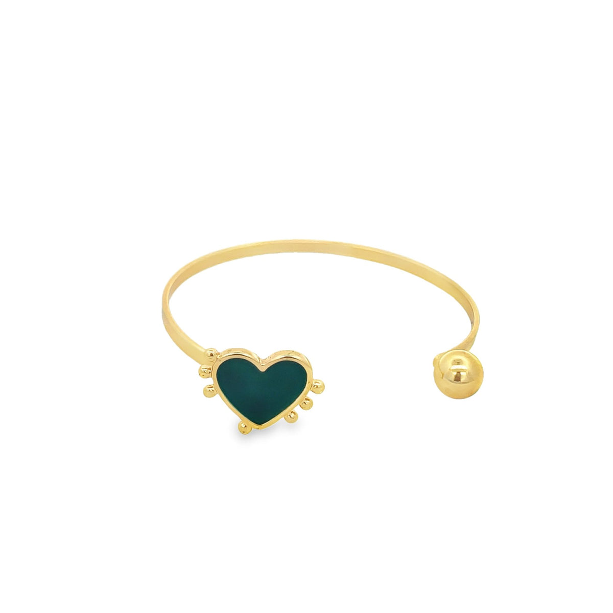 A gold open-cuff bracelet features a deep green heart-shaped charm and a polished sphere terminal.