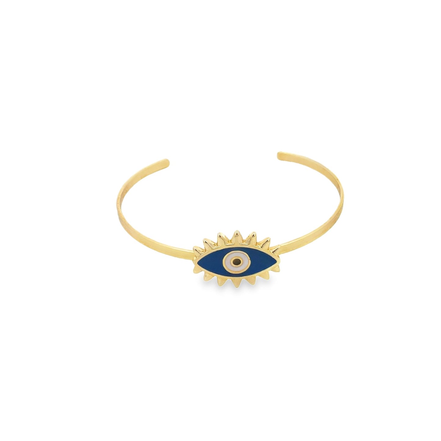 A gold cuff bracelet features a blue and white enamel evil eye charm centered against a white background.