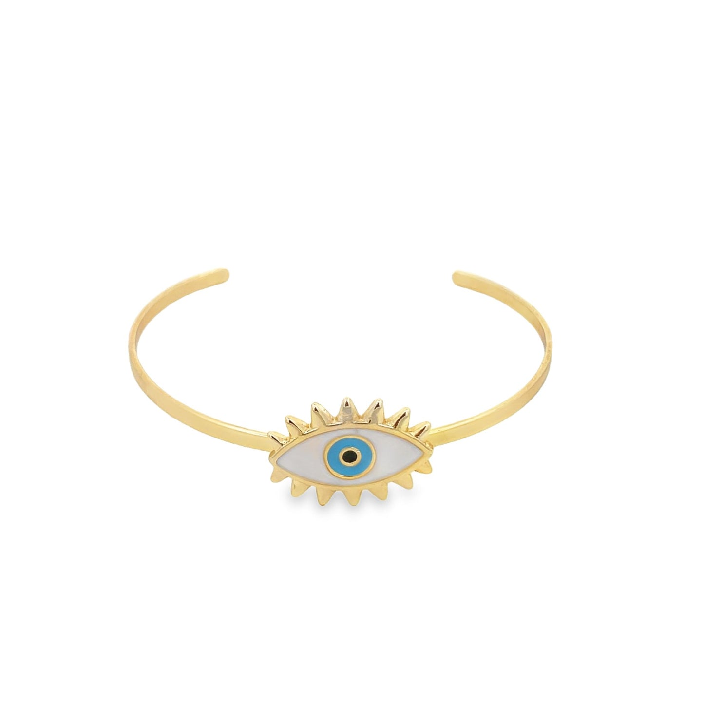 A gold evil eye cuff bracelet features an enamel blue and white eye charm centered on the open band.