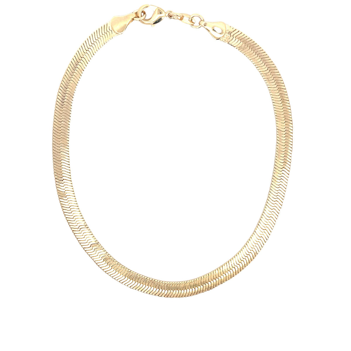 A shiny yellow gold herringbone chain necklace curves neatly against a plain white background.