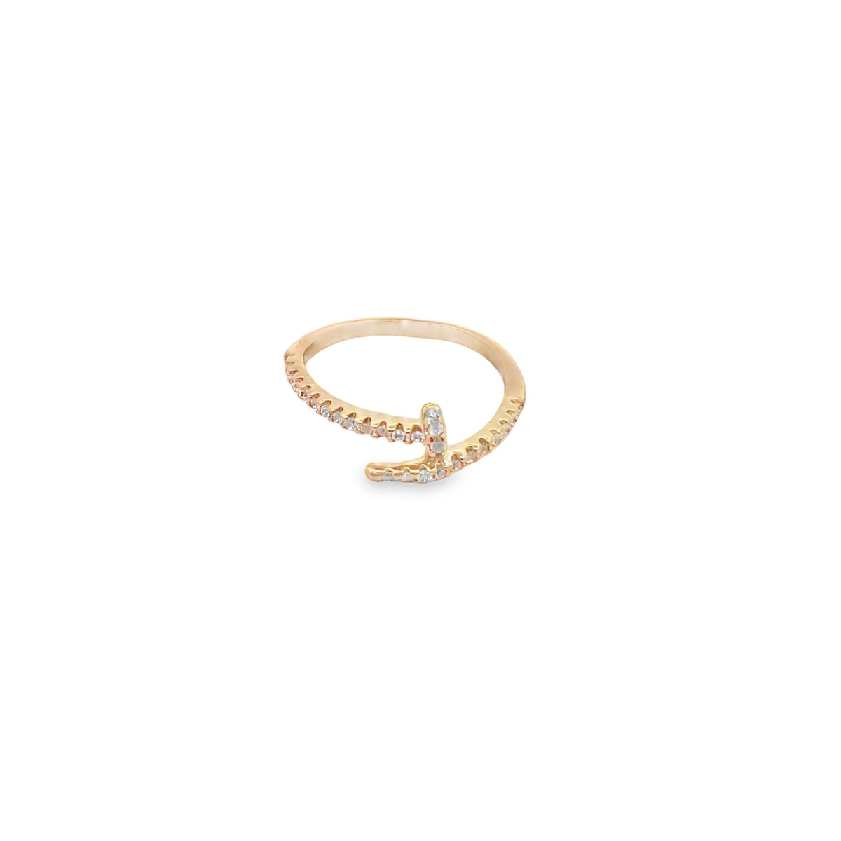 A delicate gold ring featuring a sparkling diamond-encrusted initial J rests on a white background.