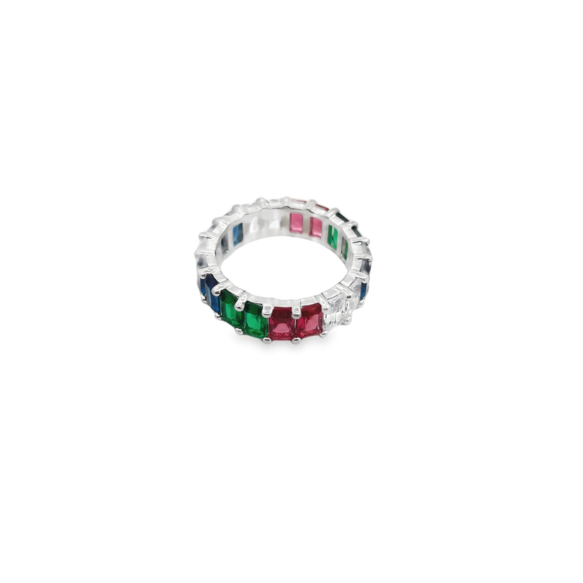 A silver eternity band features multicolored baguette-cut stones in vibrant shades of green, red, blue, and white.