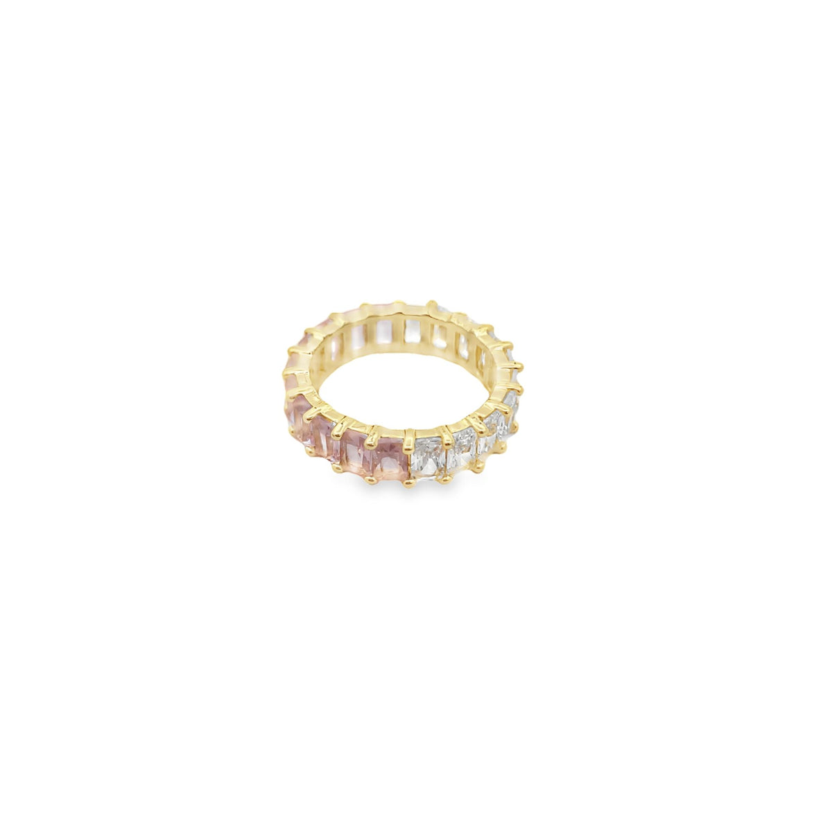 A gold eternity ring features alternating pink and white emerald-cut gemstones against a clean white background.