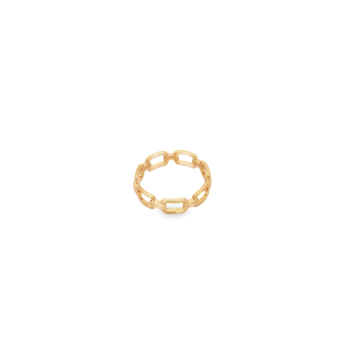 A delicate gold chain link ring rests on a clean white background.