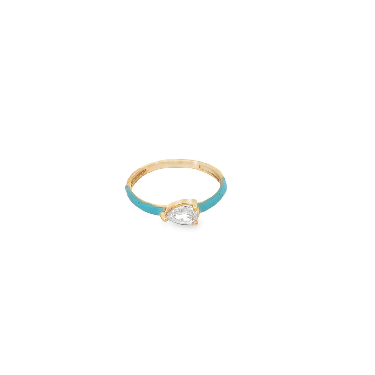 A gold ring featuring bright turquoise enamel accenting the band and a sparkling pear-shaped diamond centerpiece rests against a clean white background.