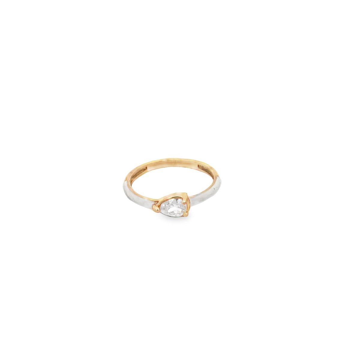 A delicate two-tone gold ring features a sparkling pear-shaped diamond set against a clean white background.