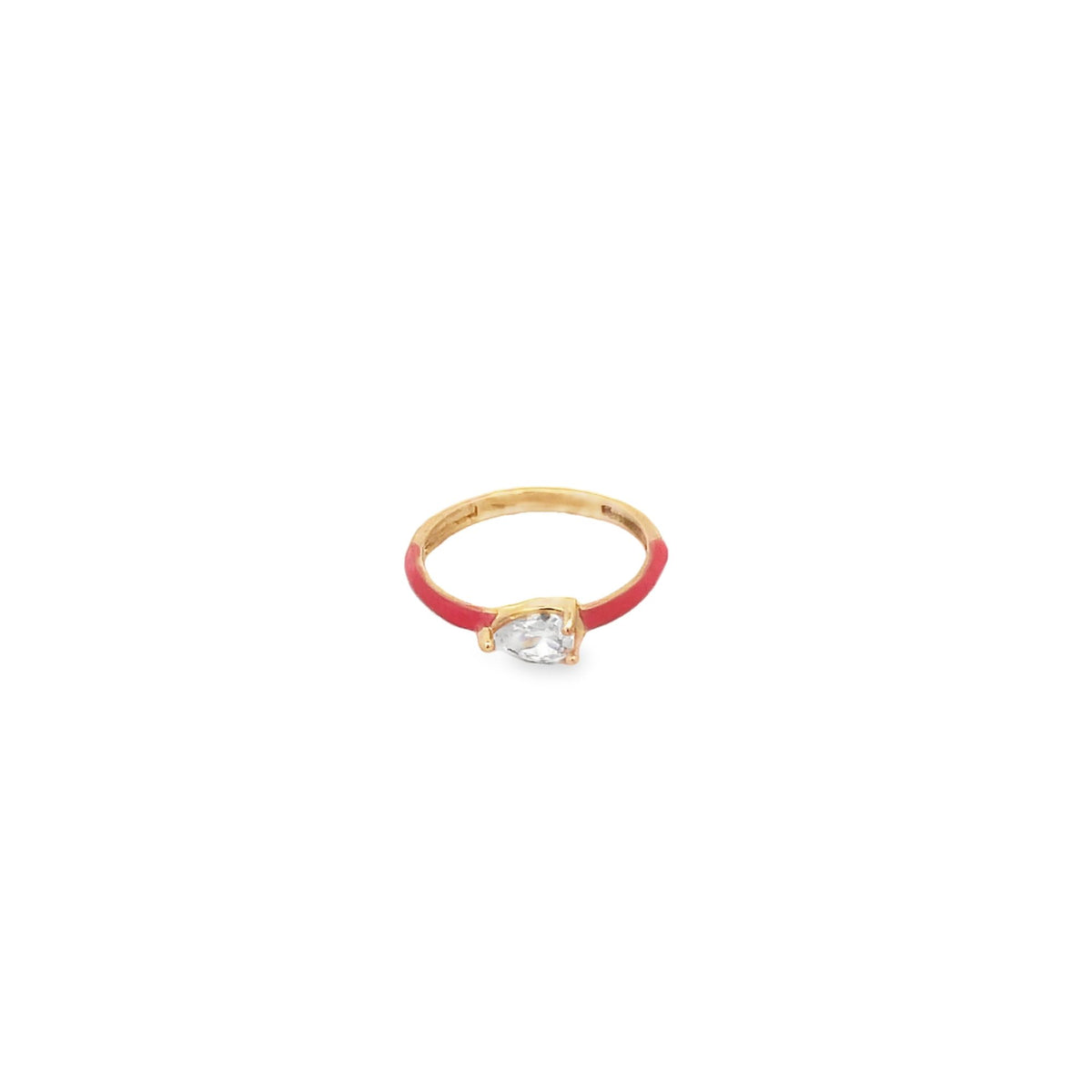 A delicate gold ring features a vibrant red enamel band and a sparkling pear-shaped cubic zirconia stone.