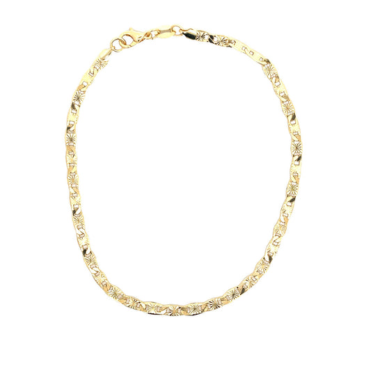 A shiny yellow gold fancy link chain necklace displays intricate starburst engravings on each interlocking link.